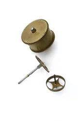 The going train and spring barrel of a table clock